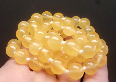 Calcite - Orange (deeper yellow) EO+ 9.8-10.6mm 26 inch