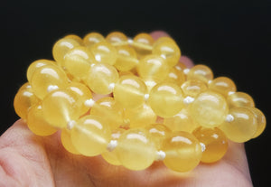 Calcite - Orange (deeper yellow) EO+ 9.8-10.6mm 27 inch